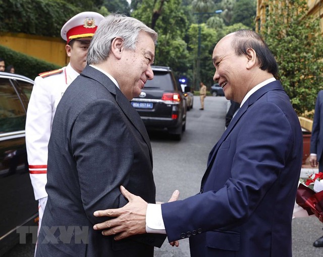 President hosts welcome ceremony for UN Secretary-General - Ảnh 1.