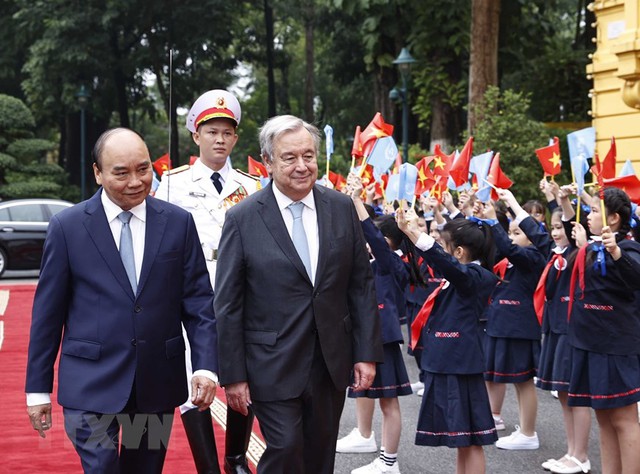 President hosts welcome ceremony for UN Secretary-General - Ảnh 4.