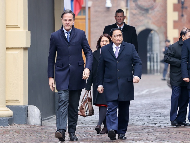 Official welcome ceremony for Vietnamese Prime Minister in Netherlands  - Ảnh 2.