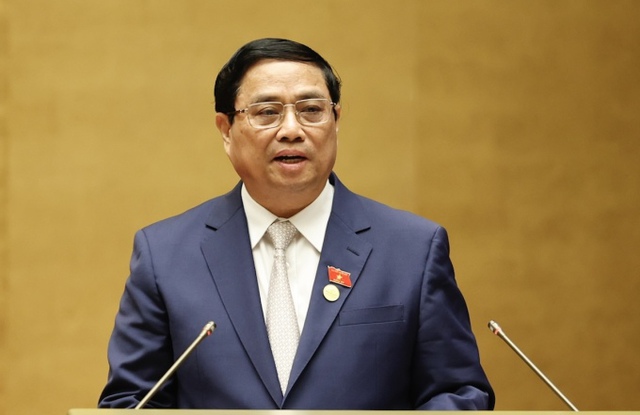 Gov't targets GDP growth target at 6-6.5% in 2024 - Ảnh 1.
