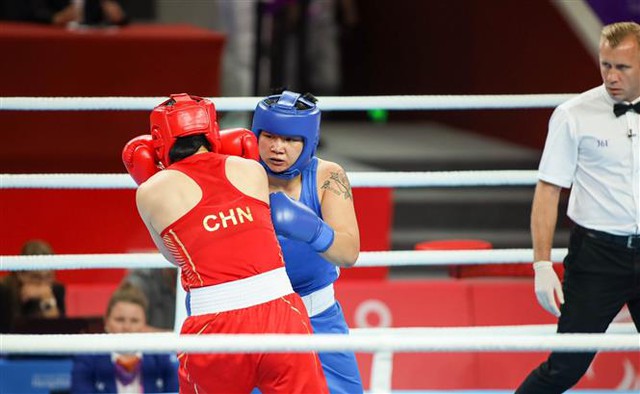 Viet Nam bags bronze medal in women's boxing at Asian Games - Ảnh 1.