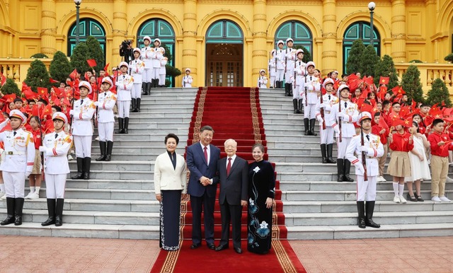 Party chief hosts official welcome ceremony for Chinese leader Xi Jinping- Ảnh 4.