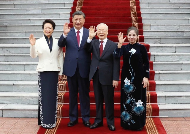Party chief hosts official welcome ceremony for Chinese leader Xi Jinping- Ảnh 5.