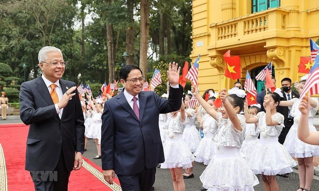 Joint press communique of Foreign Ministers of Viet Nam and Malaysia - Ảnh 1.