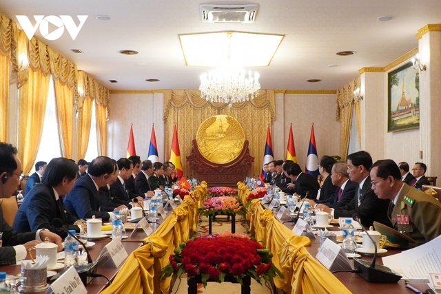 Pictures: Official welcome ceremony for Vietnamese President in Laos - Ảnh 5.