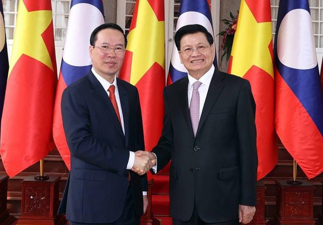 President holds talks with Party General Secretary, President of Laos - Ảnh 1.