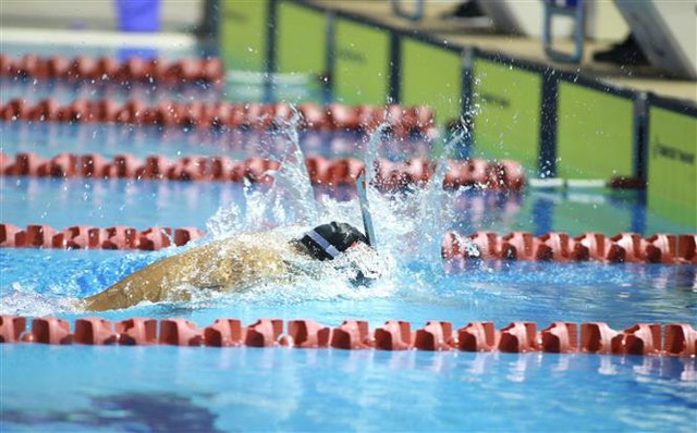 Viet Nam proves power with 20 golds, records in ninth SEA Games day - Ảnh 2.