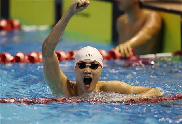 Viet Nam bags golds and record in SEA Games' day 2 - Ảnh 1.