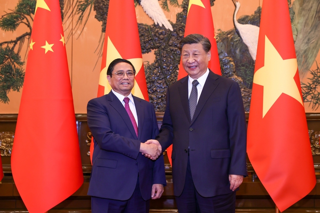 Prime Minister Pham Minh Chinh meets Chinese President Xi Jinping - Ảnh 1.