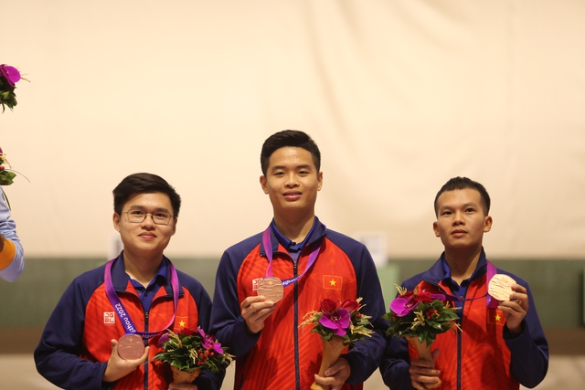 Vietnamese marksman Huy brings home an Asian Games gold medal - Ảnh 2.