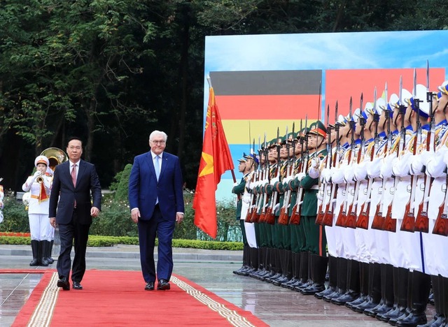 President hosts official welcome ceremony for German counterpart- Ảnh 2.