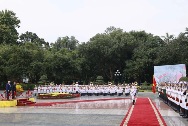 President hosts official welcome ceremony for German counterpart- Ảnh 3.