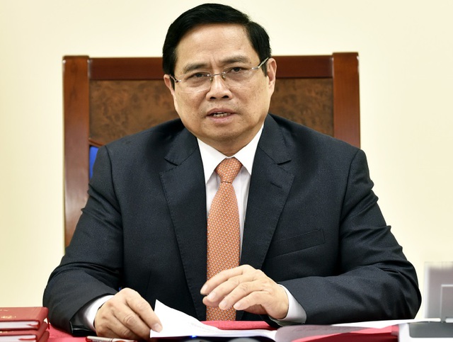 Prime Minister Pham Minh Chinh to attend ASEAN Summits in Laos next week- Ảnh 1.