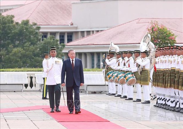 Malaysian Prime Minister hosts official welcome ceremony for To Lam- Ảnh 1.