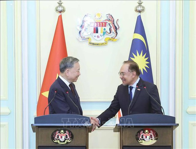 Viet Nam, Malaysia upgrade ties to comprehensive strategic partnership- Ảnh 1.