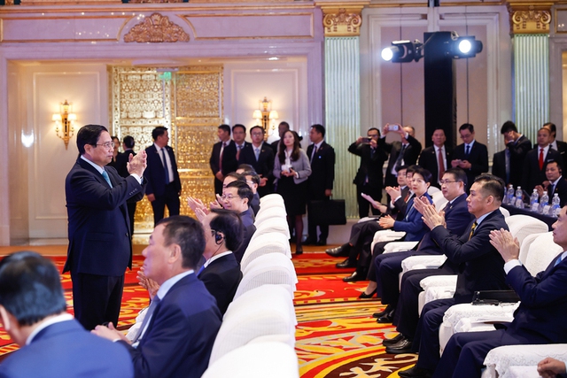 PM calls for stronger business partnership between Viet Nam and China- Ảnh 1.