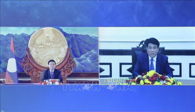 President Luong Cuong holds online talks with top Lao leader - Ảnh 1.