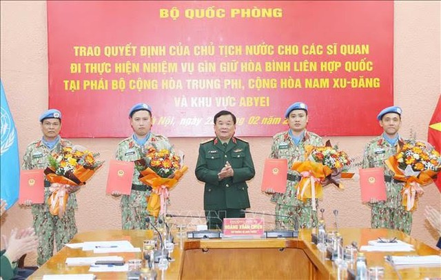 Four Vietnamese officers to depart for UN peacekeeping missions- Ảnh 1.