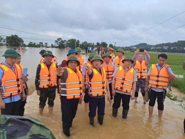 Prime Minister demands all-out efforts on flood control, evacuation in Bac Giang- Ảnh 2.