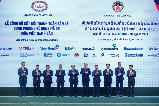 Viet Nam, Laos launch cross-border QR payment service - Ảnh 1.