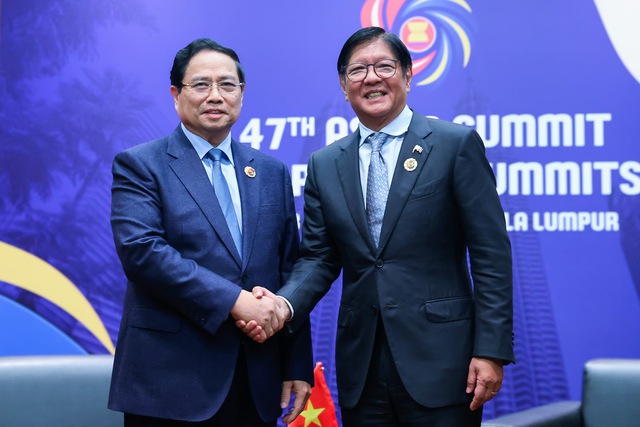 Prime Minister Pham Minh Chinh meets Philippine President, Thai counterpart in Malaysia- Ảnh 1. Prime Minister Pham Minh Chinh meets Philippine President, Thai counterpart in Malaysia- Ảnh 1.