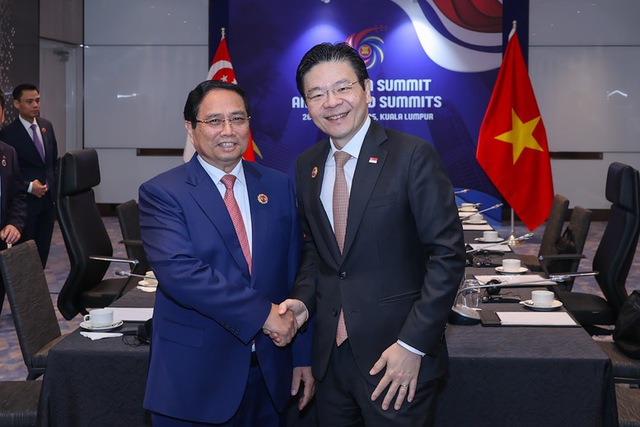 Vietnamese, Singaporean PMs convene second annual meeting in Kuala Lumpur- Ảnh 1. Vietnamese, Singaporean PMs convene second annual meeting in Kuala Lumpur- Ảnh 1.