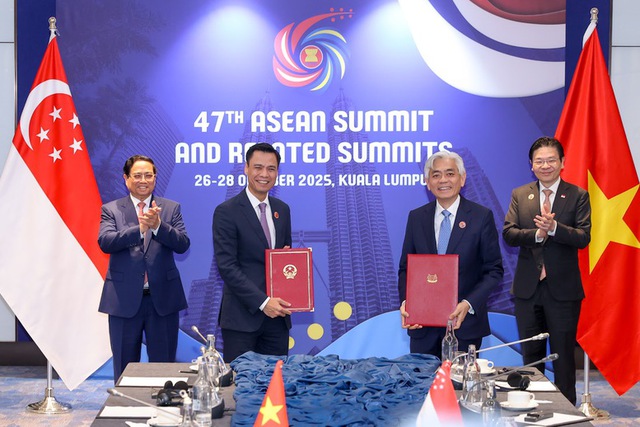 Vietnamese, Singaporean PMs convene second annual meeting in Kuala Lumpur- Ảnh 2. Vietnamese, Singaporean PMs convene second annual meeting in Kuala Lumpur- Ảnh 2.
