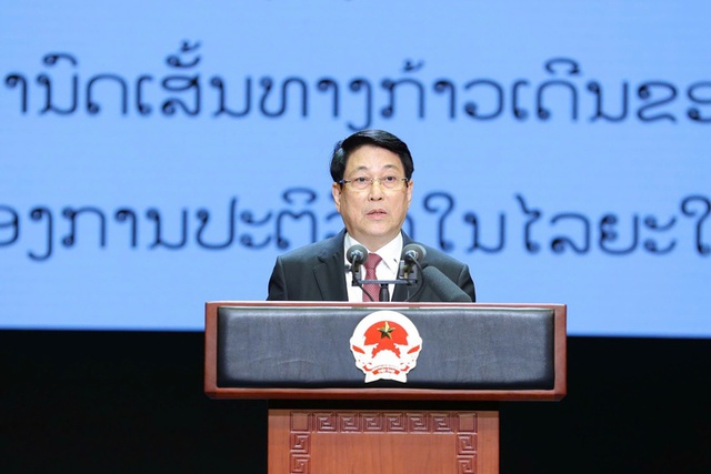 State leader attend celebration of Laos' 50th National Day- Ảnh 1.