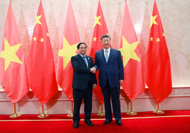 Prime Minister Pham Minh Chinh meets top Chinese leader Xi Jinping- Ảnh 1. Prime Minister Pham Minh Chinh meets top Chinese leader Xi Jinping- Ảnh 1.