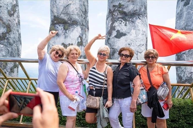 Viet Nam welcomes 12.2 million foreign visitors in first seven months- Ảnh 1.