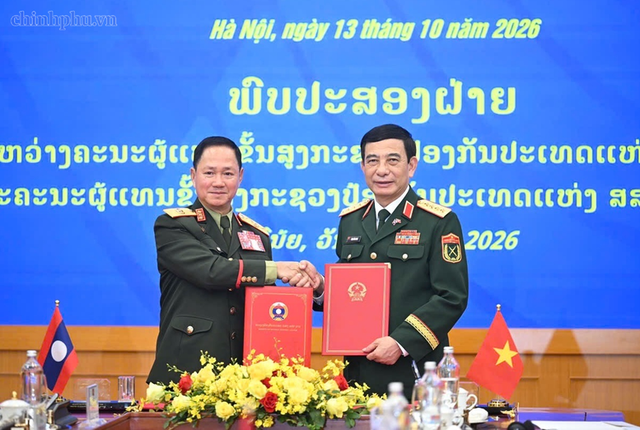 Viet Nam, Laos sign defense cooperation plan for 2027- Ảnh 1.