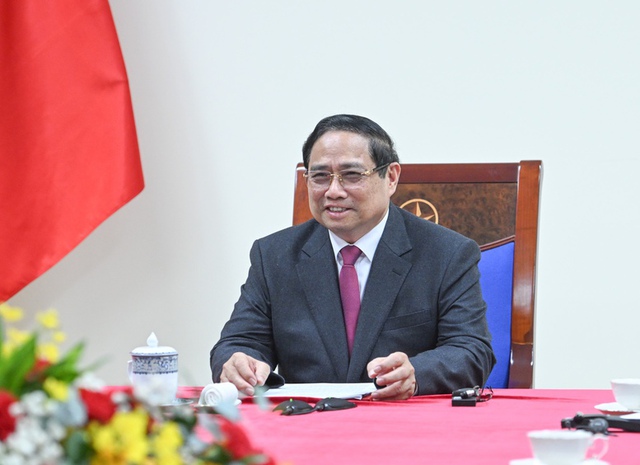 Vietnamese, Singaporean Prime Ministers hold phone talks- Ảnh 1.