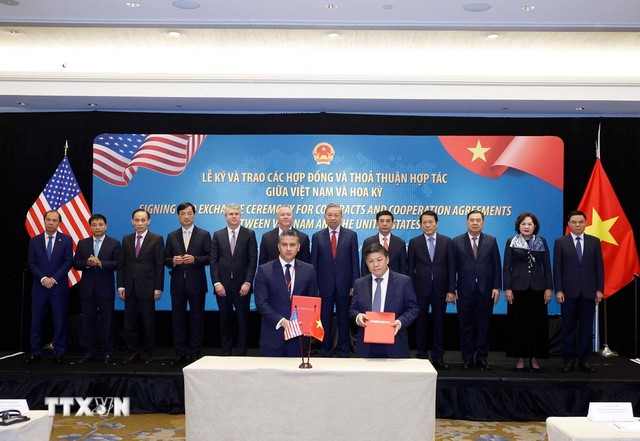 Viet Nam, U.S. sign cooperation agreements- Ảnh 3.