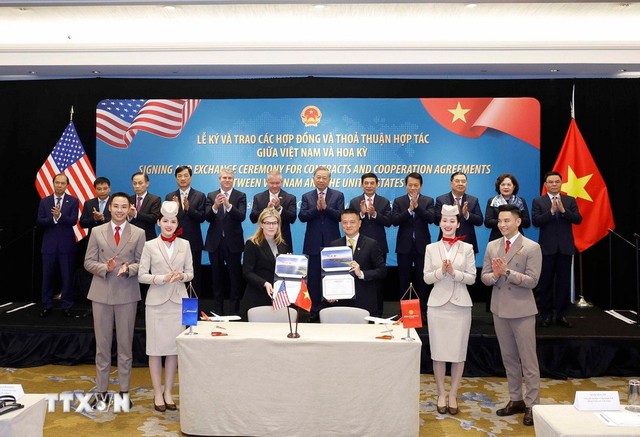 Viet Nam, U.S. sign cooperation agreements- Ảnh 4.