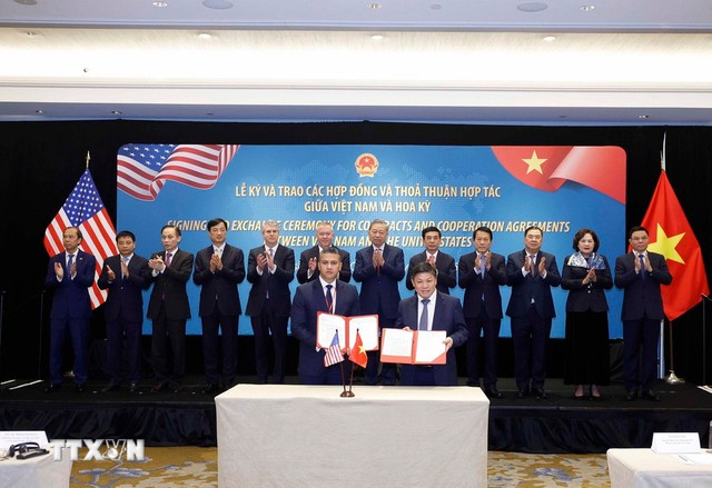 Viet Nam, U.S. sign cooperation agreements- Ảnh 5.