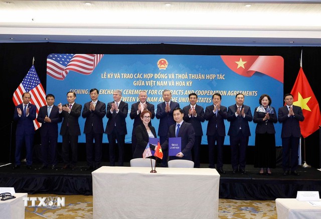 Viet Nam, U.S. sign cooperation agreements- Ảnh 7.