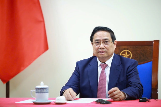 Prime Minister Pham Minh Chinh holds phone conversation with Angolan President - Ảnh 1.