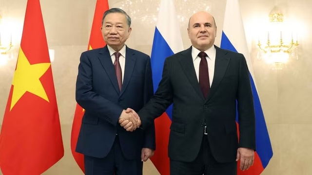 To Lam meets with Russian Prime Minister Mikhail Mishustin- Ảnh 1.