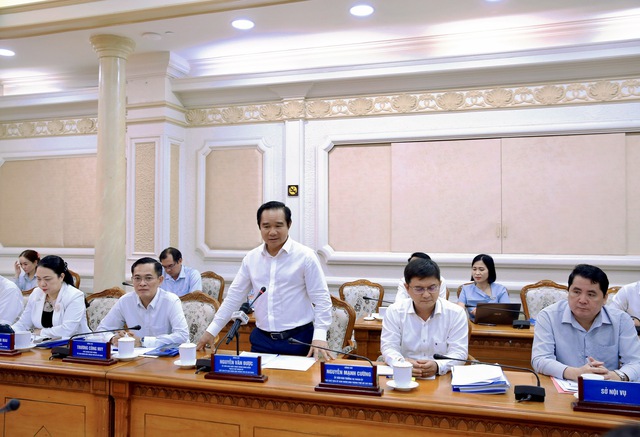 Đoàn công tác VPCP làm việc với UBND TPHCM về thực hiện Nghị quyết 66/NQ-CP và Nghị định 118/2025/NĐ-CP- Ảnh 2.