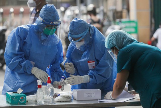 1月28日：越南62个省市新增14,929例新冠肺炎确诊病例 - Ảnh 1.