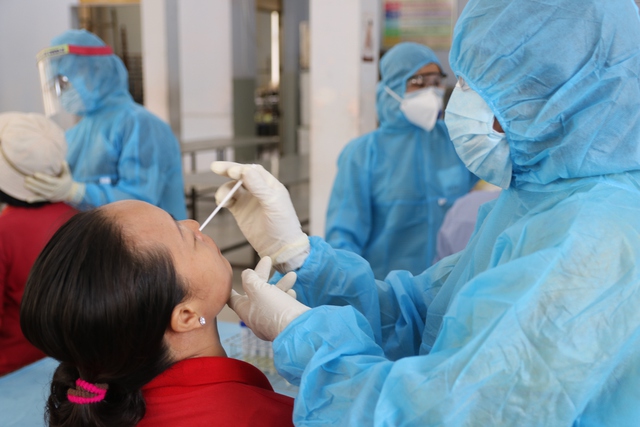 越南新冠肺炎疫情：14日新增确诊病例29413例  - Ảnh 1.