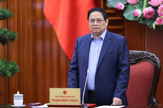 政府总理范明正：不让生产经营和消费等领域出现电力短缺情况 - Ảnh 1.