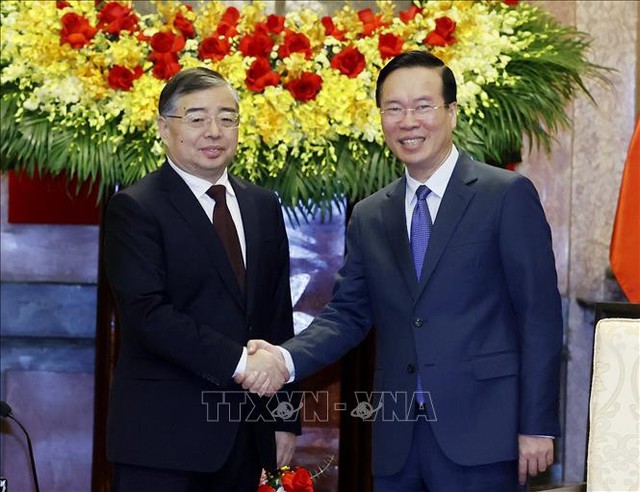 越南国家主席武文赏会见中共中央宣传部部长李书磊- Ảnh 1.