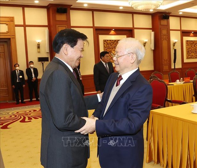 越南共产党与老挝人民革命党高层会晤  进一步加强越老特殊团结关系- Ảnh 1.