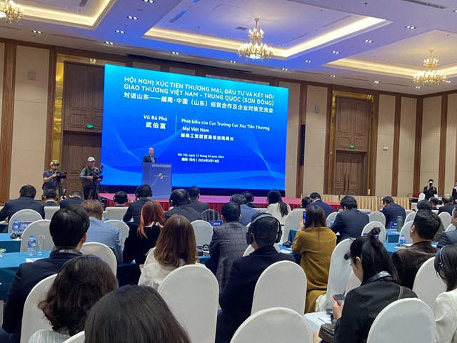 越南-中国山东经贸合作及企业对接交流会在河内举行- Ảnh 1.