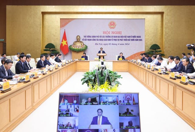 越南政府总理范明正主持召开2024年经济外交工作会议- Ảnh 1.