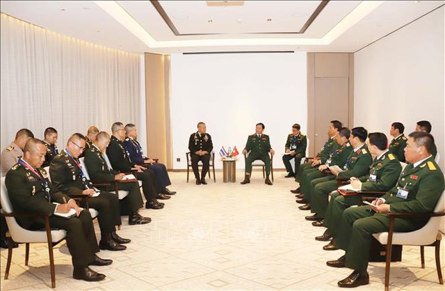 国防部副部长阮新疆出席第21届东盟国防力量司令级会议 同与会各国代举行双边会晤- Ảnh 2.