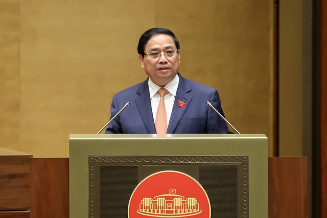 范明政总理向国会作政府工作报告- Ảnh 1.