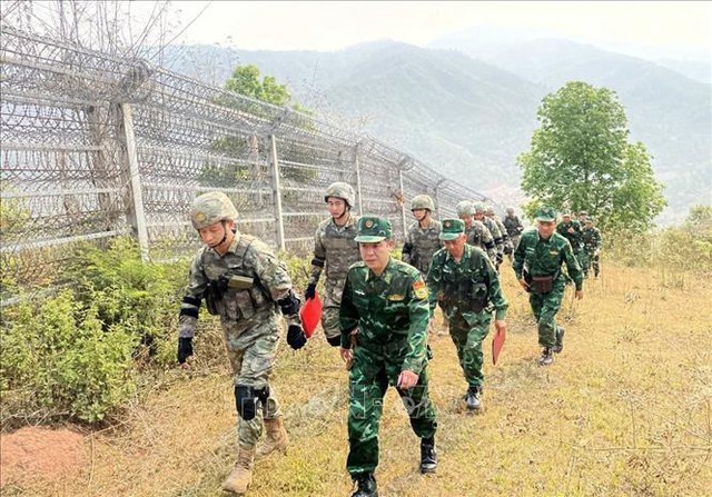 越南中国边界线进行联合巡逻- Ảnh 1.