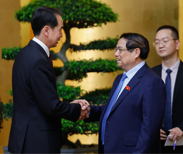 范明正总理会见中国驻越南大使何炜- Ảnh 1.